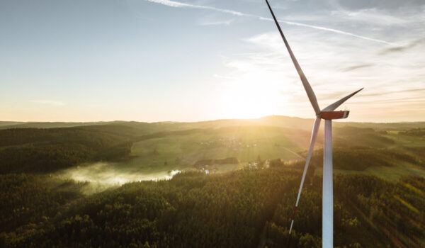 Wind Turbine in the sunset seen from an aerial view © Benedikt Altschuh/actionpixel.de