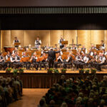 Die Musikerinnen und Musiker der Werkkapelle im Festsaal des WACKER Belegschaftshauses  (Quelle: WACKER)