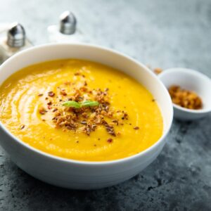 Traditional pumpkin soup with crunchy onion